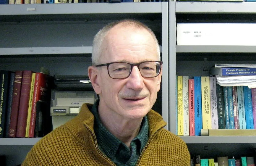 Headshot of John W Rudinicki