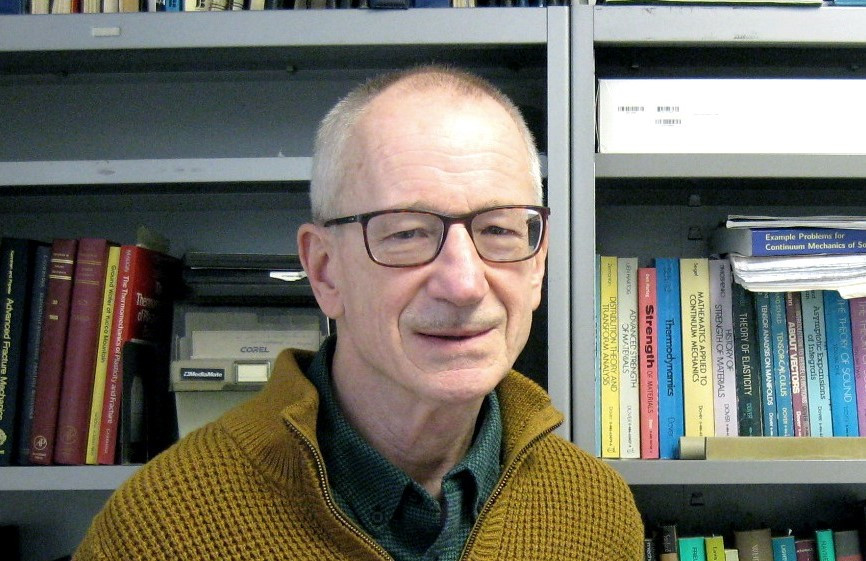 Headshot of John W Rudinicki