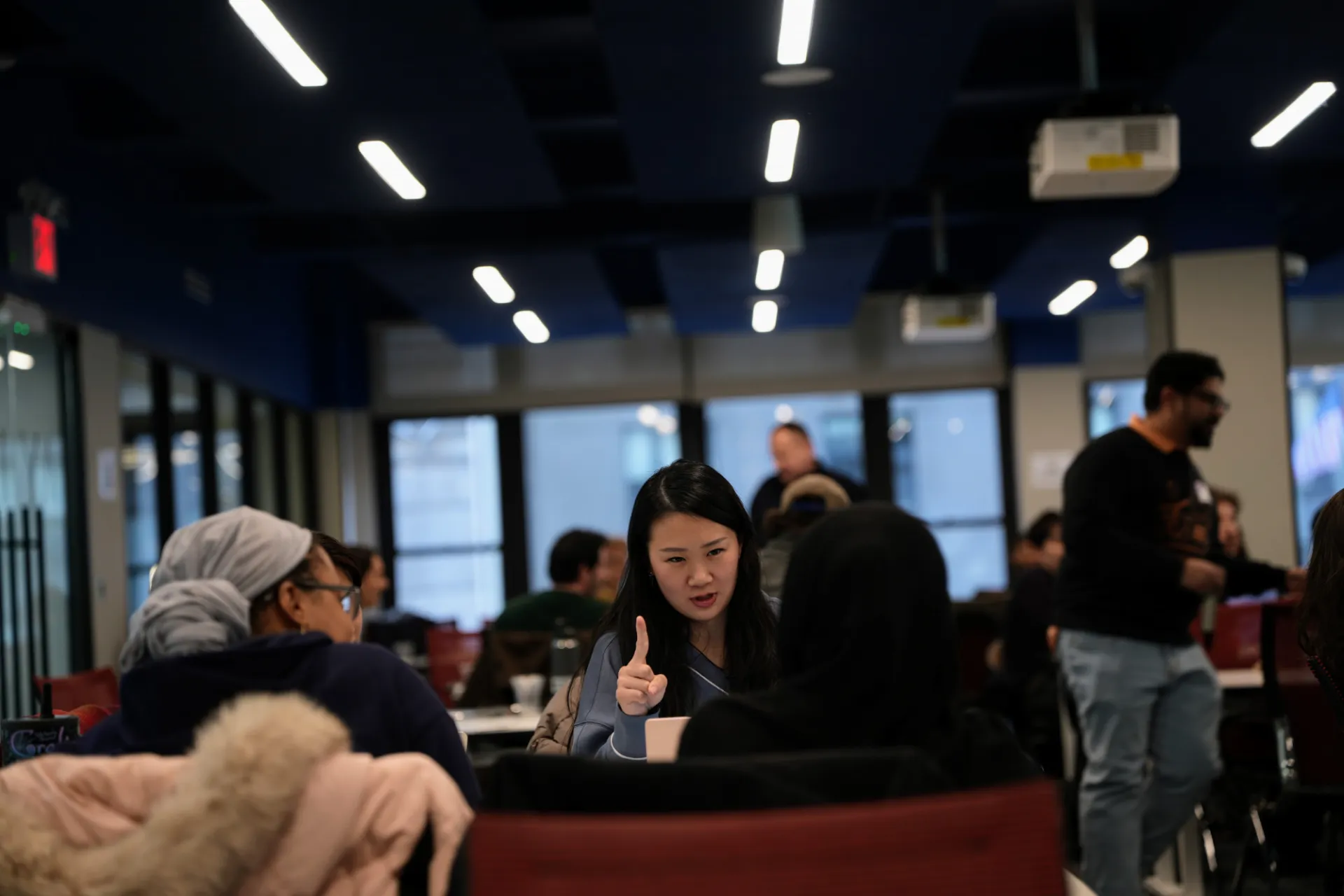 Rachel Huang working with her team