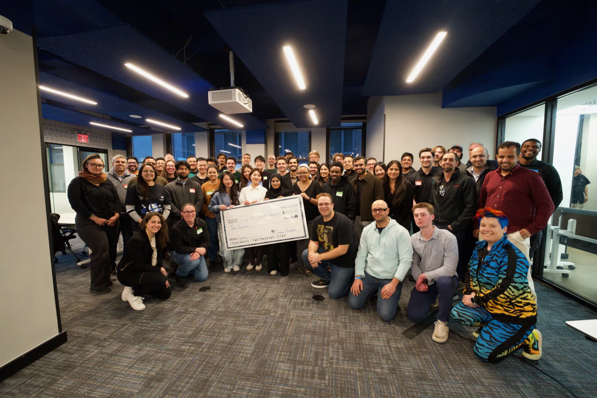 Group photo of Rachel Huang with her prize
