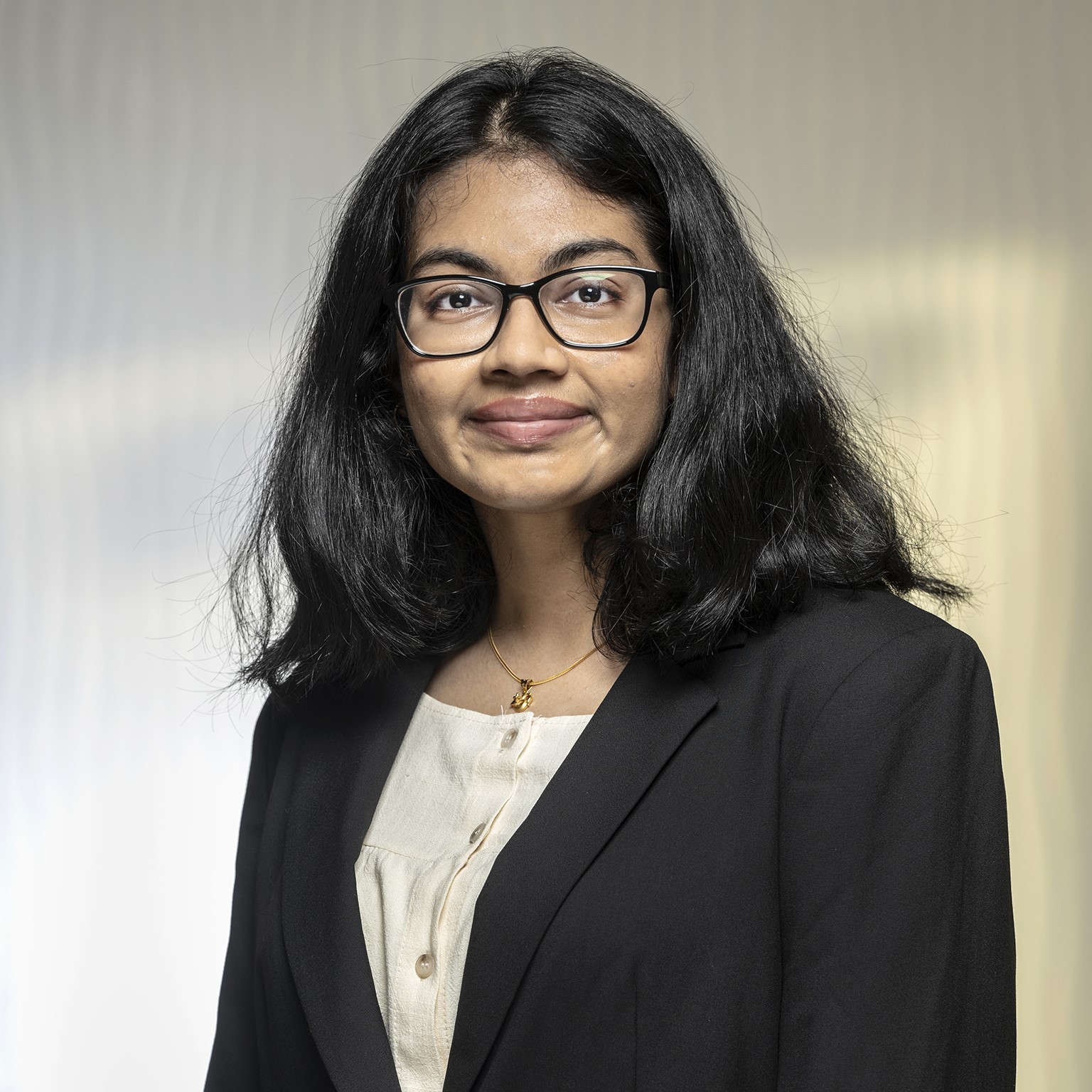 Professional headshot of Arpita Saha